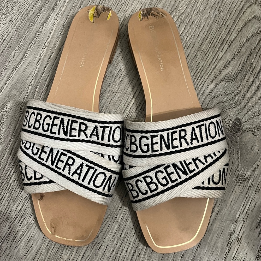 BCBGeneration Women's Black and White Slide Sandals